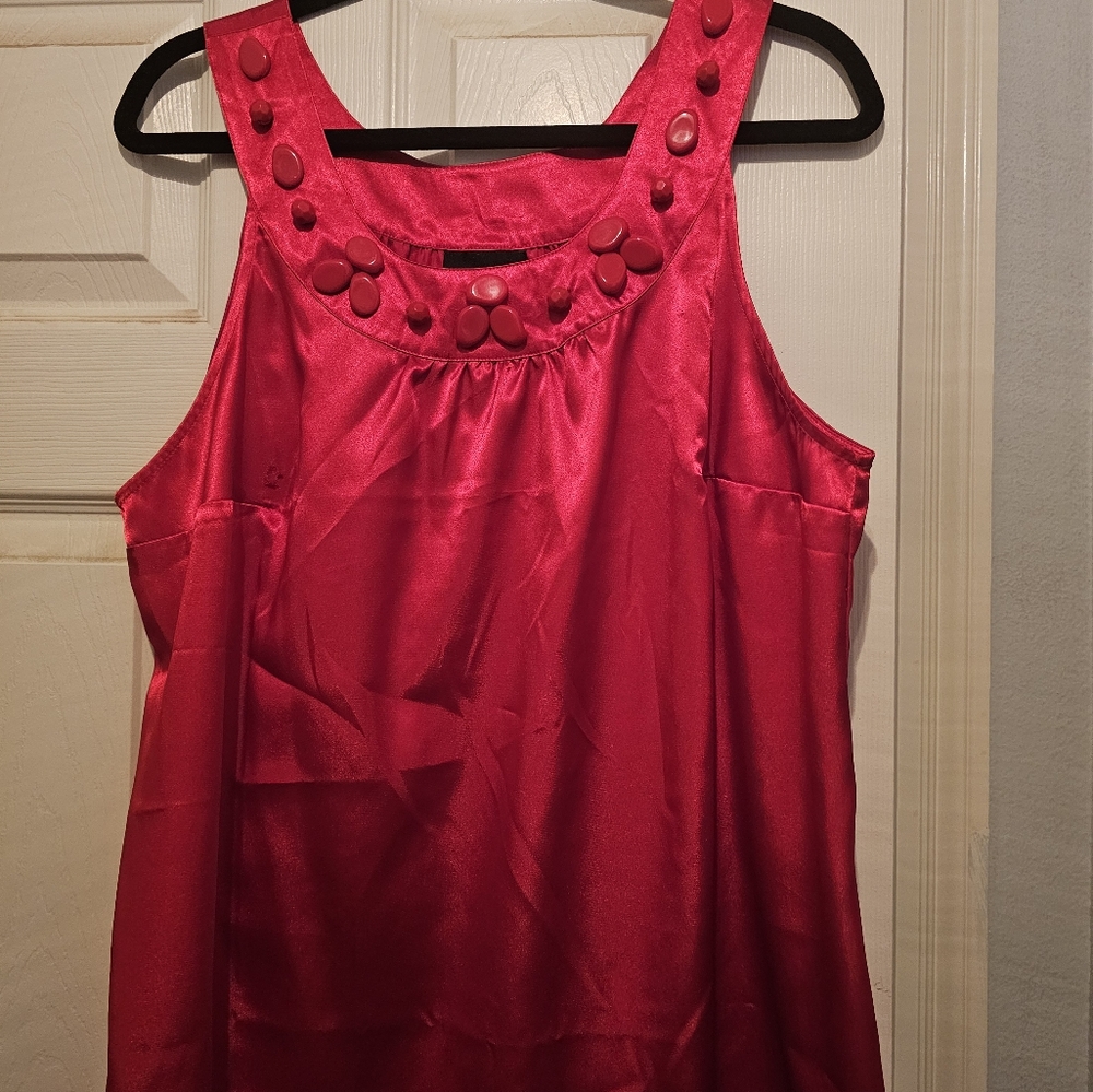 Red embellished sleeveless blouse
